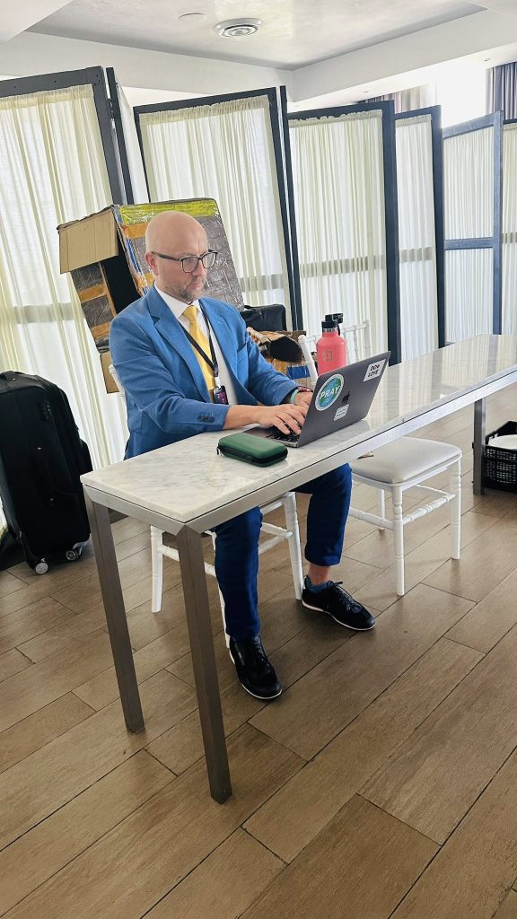 Maciek Lyko working with laptop